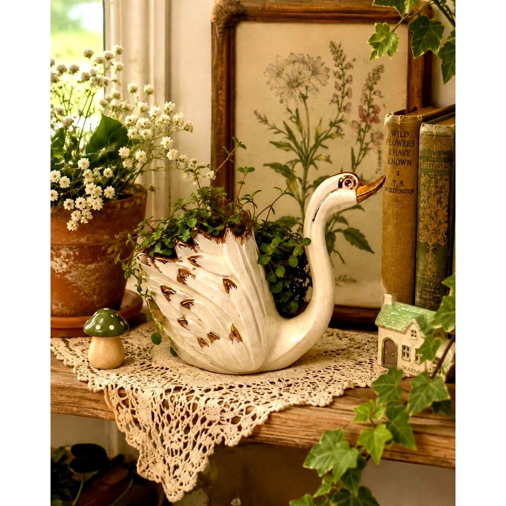 ceramic swan planter glossy white body gilded gold feather tips pink interior